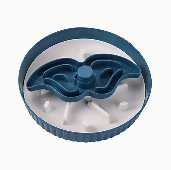 Grey rotating pet slow feeder bowl with a blue silicone windmill-pattern licking mat attached.