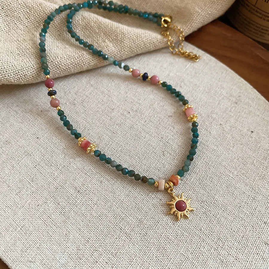 Stone freshwater pearl sun necklace with French royal style pendant on adjustable clavicle chain