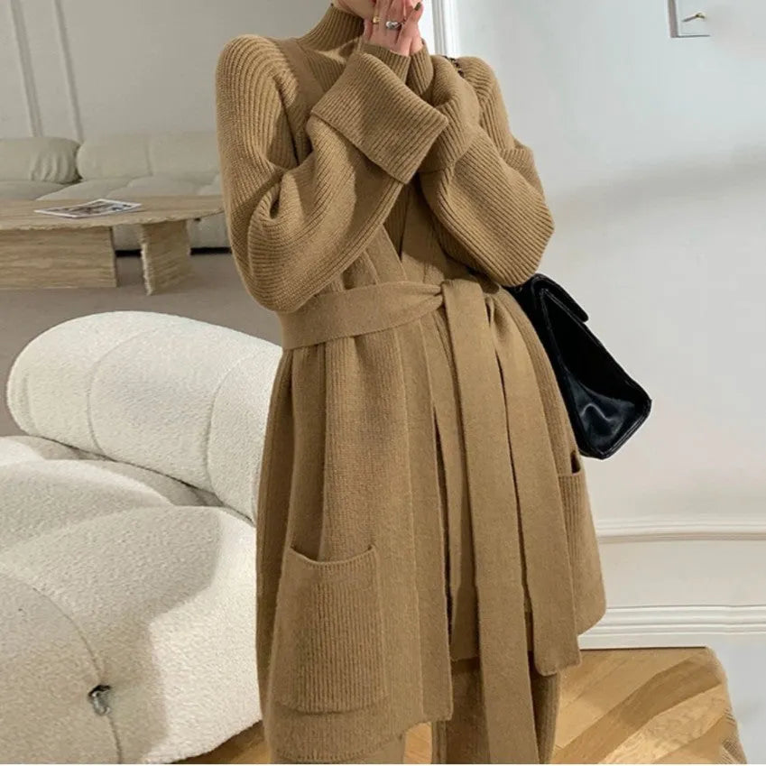 Women's knitted three-piece clothing set showing cardigan, wide-leg trousers, and top with leather stitching detail