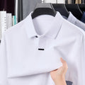 Men's grey cotton polo shirt with lapel collar and long sleeves showing loose fit design