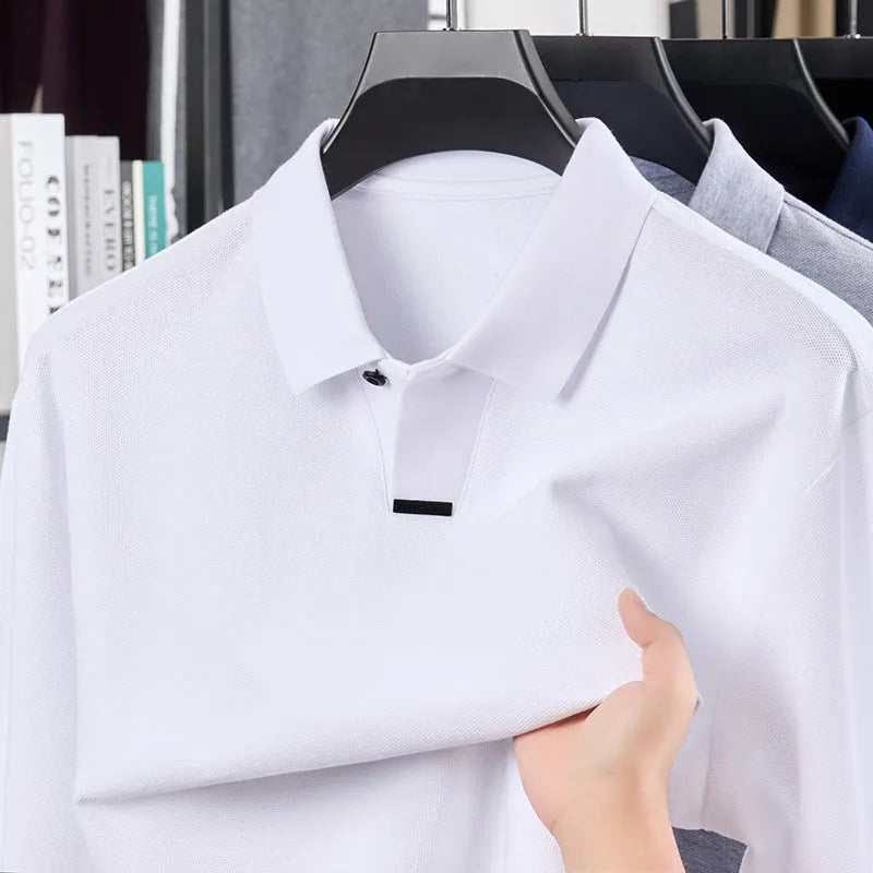Men's grey cotton polo shirt with lapel collar and long sleeves showing loose fit design