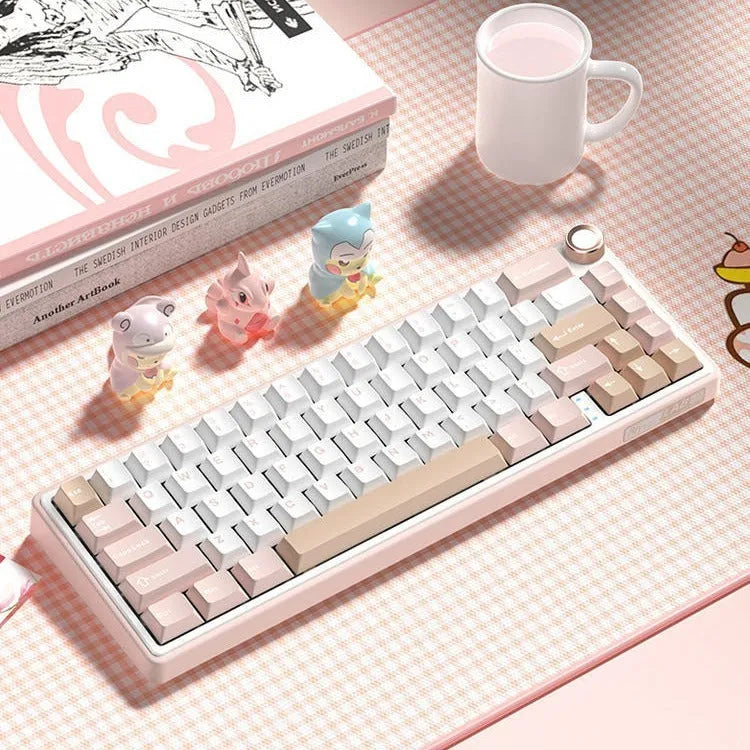 White wireless mechanical keyboard with RGB backlit keys on a desk.