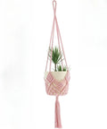 Handwoven brown polyester cotton flower pot net sleeve covering a plant pot.