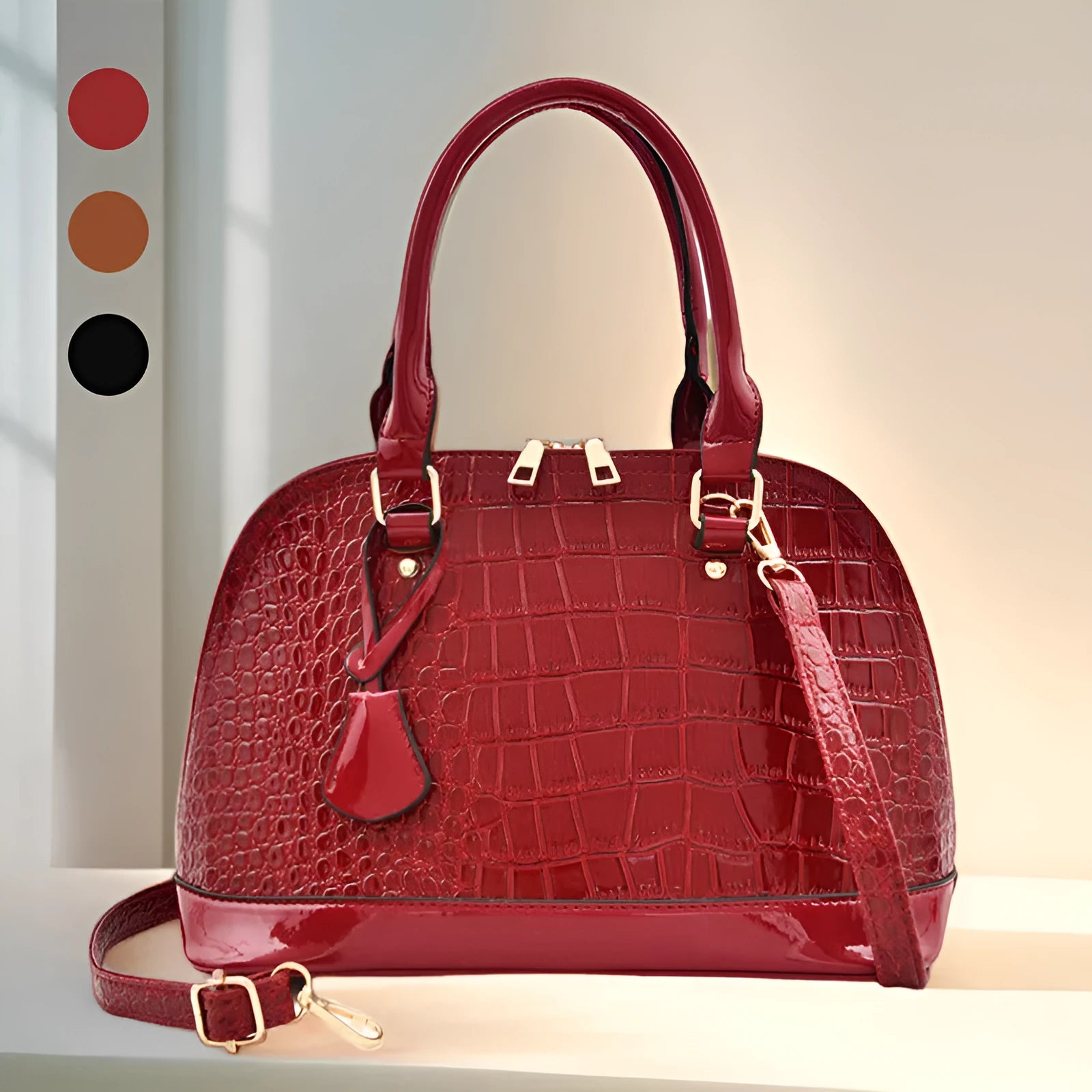 Large shiny black PU shoulder bag with crossbody strap showing interior polyester lining