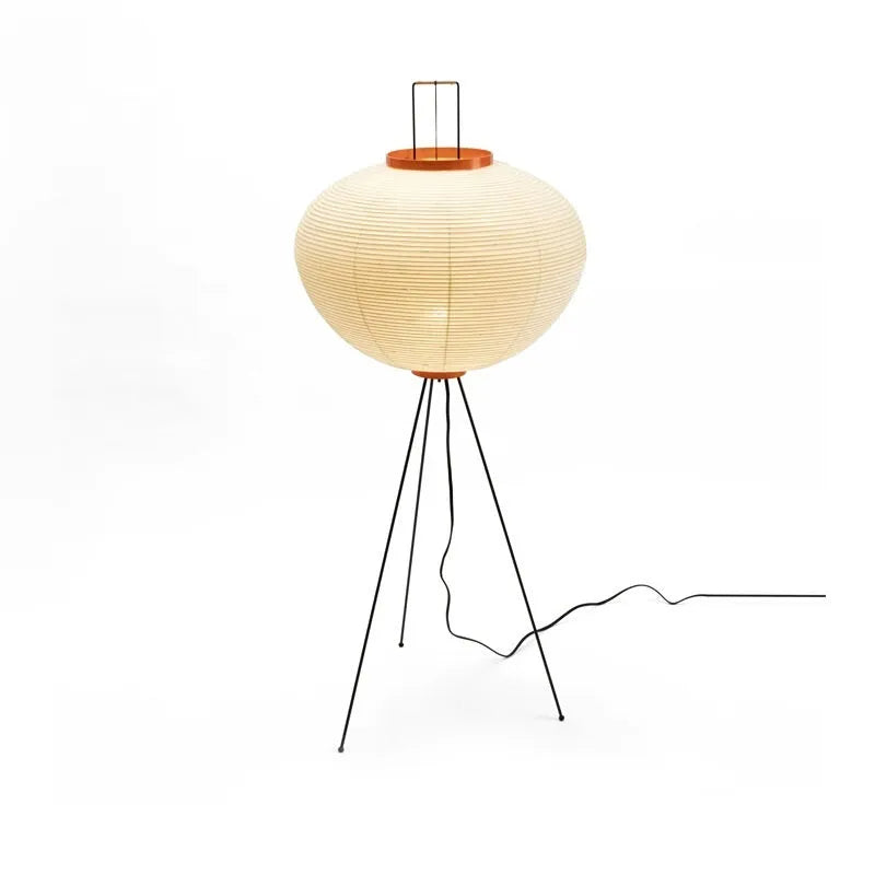 Handmade Nordic-style table lamp with a Japanese rice paper shade and aluminium base on a wooden table