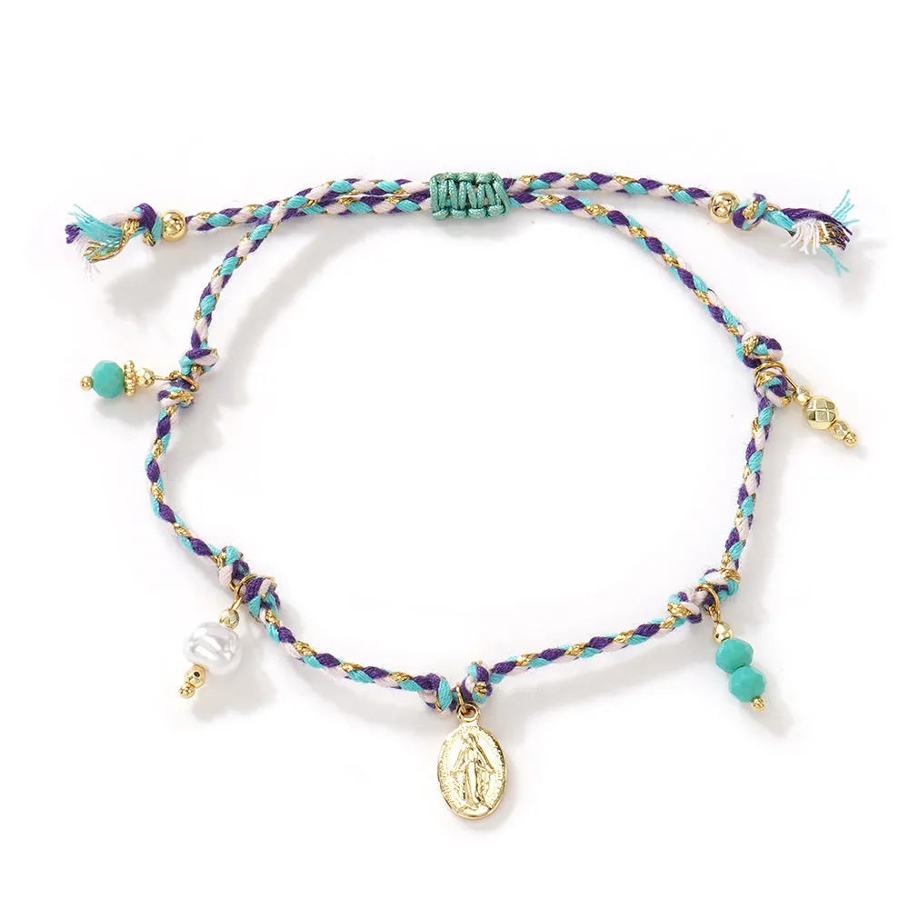 Close-up of a hand-woven colourful braided rope bracelet for women with a carrying strap tag.