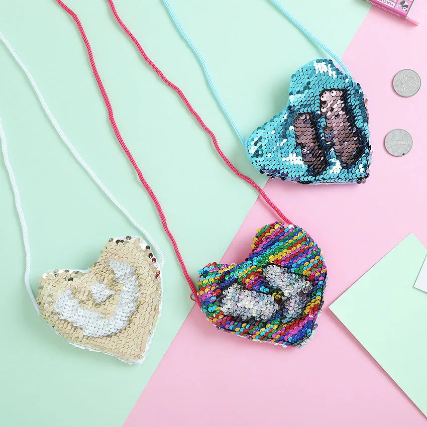 Sequined heart-shaped crossbody purse in gold with lanyard strap