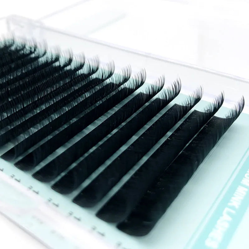 Soft artificial fibre velvet false eyelashes showing volume and length options from 0.05CC to 0.2CC and 7mm to 15mm.