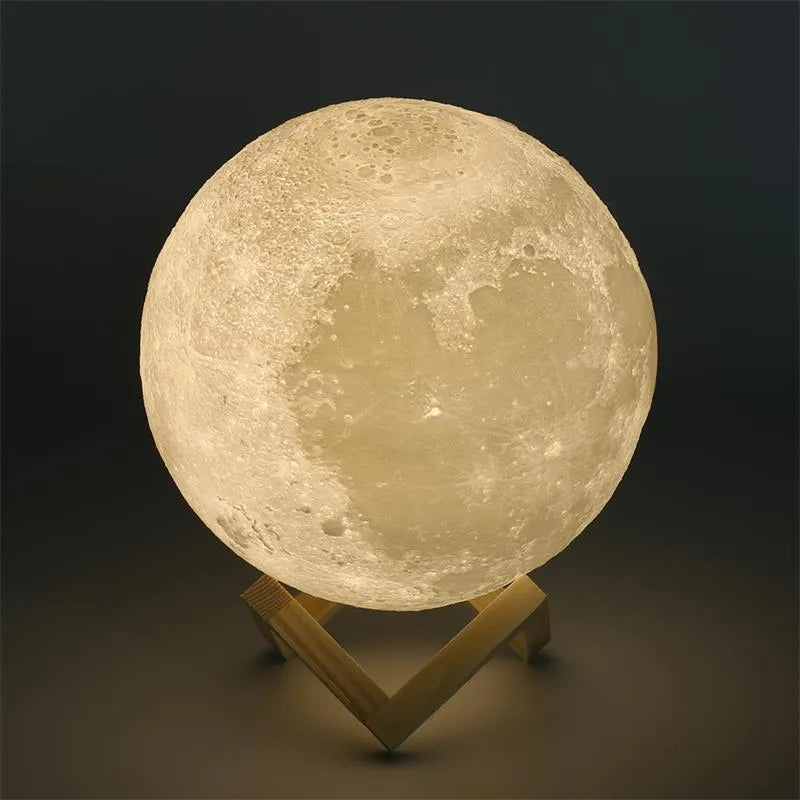 3D printed white moon lamp on wooden stand with colour-changing LED light