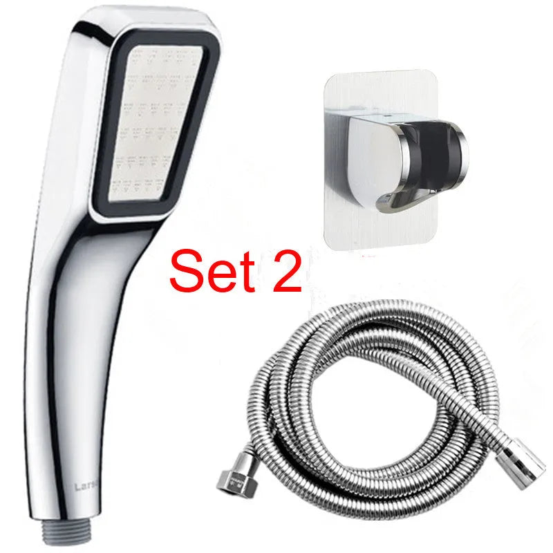 Orange hand-held rain shower set with pressurised function showing shower head and connection