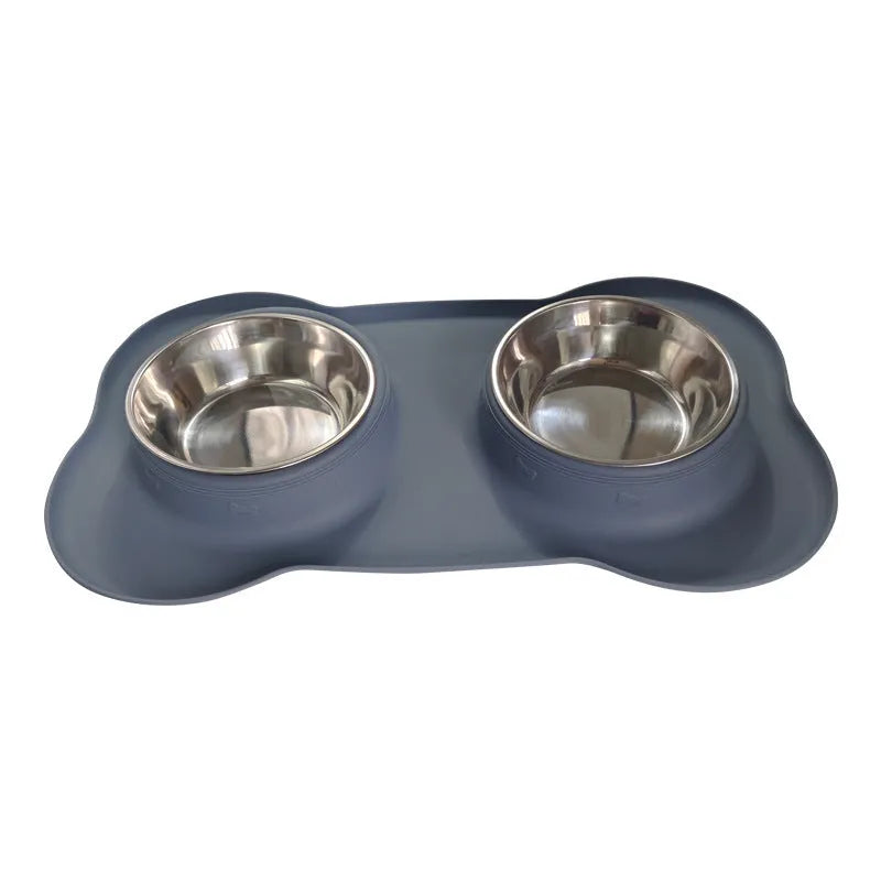 Large silicone dog bowl with stainless steel insert in choice of five colours on a plain background.