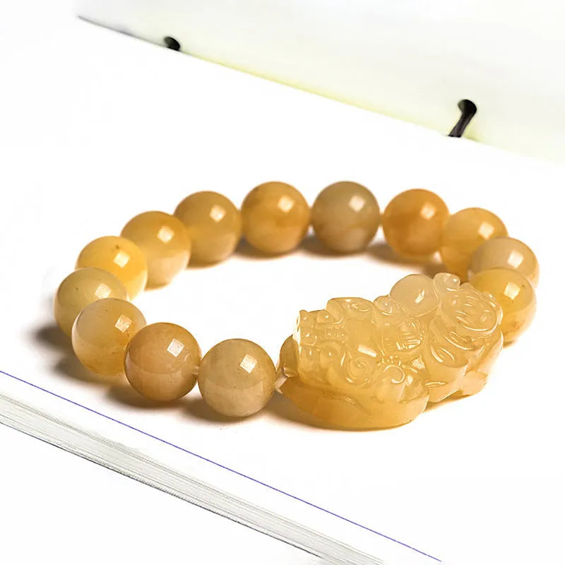 Jade money bracelet showing carved Jinsi Jade stone with beads in Golden Thread Jade colour