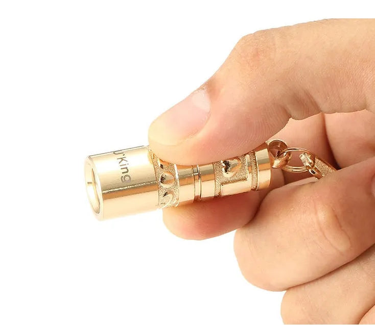 Gold zinc alloy emergency keychain flashlight with LED light and keyring attachment