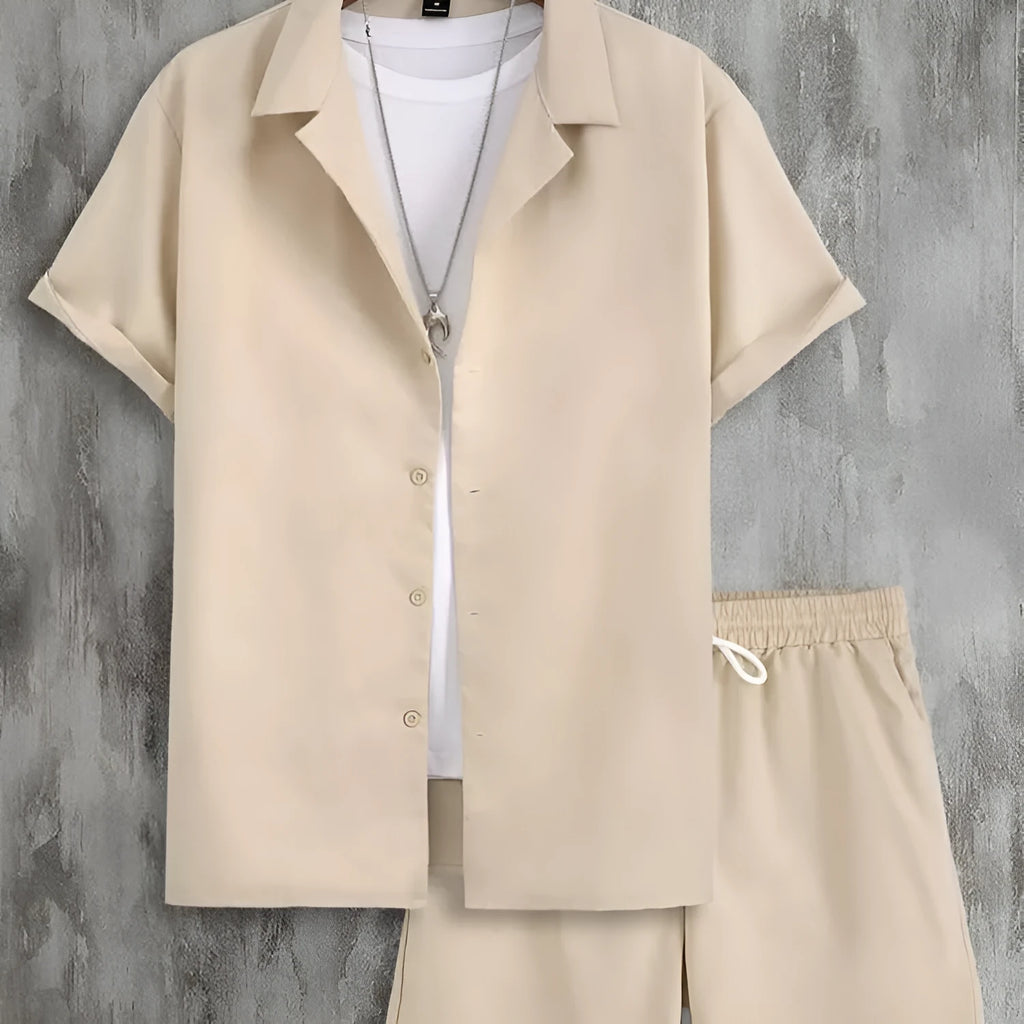 Man wearing a white Cuban collar short sleeve shirt and matching shorts from a men's sport suit set.