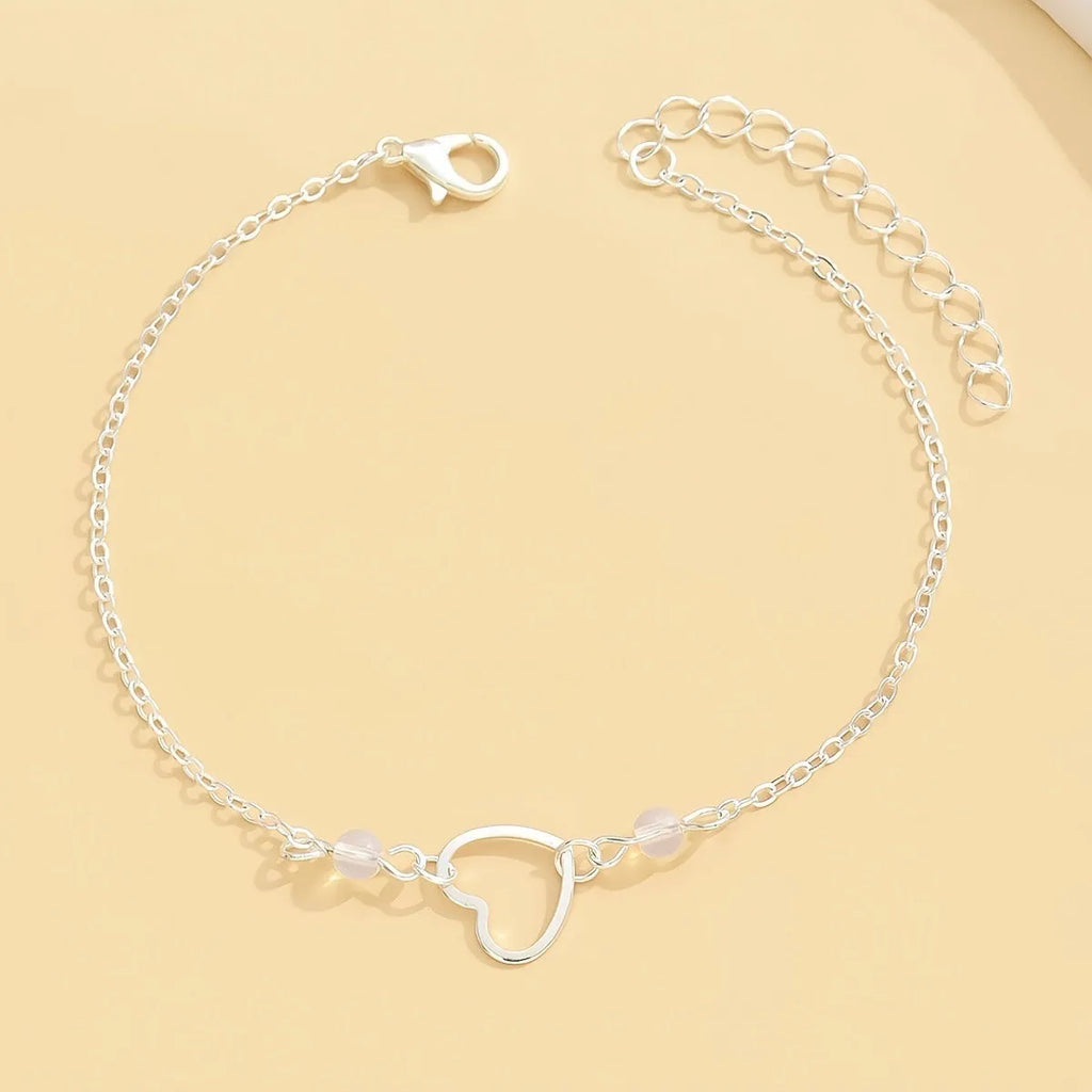Adjustable heart pendant anklet in gold or silver with geometric design