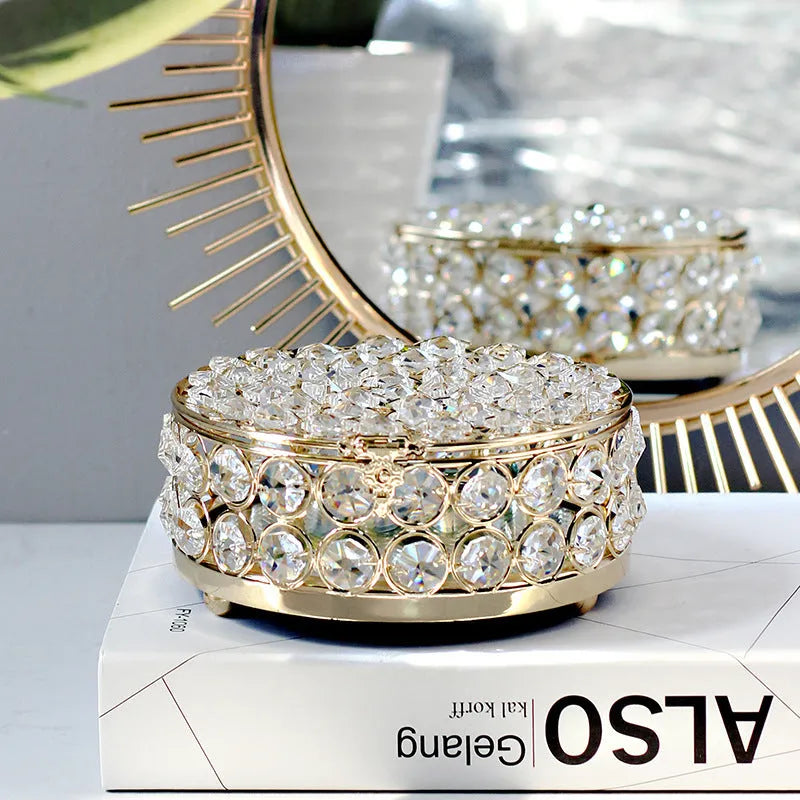 French gold metal frame jewellery box with transparent crystal glass panels displaying contents
