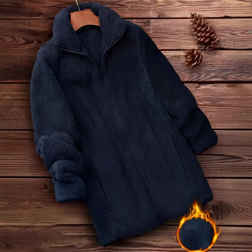 Double-sided velvet fleece jacket in black, shown on a hanger.