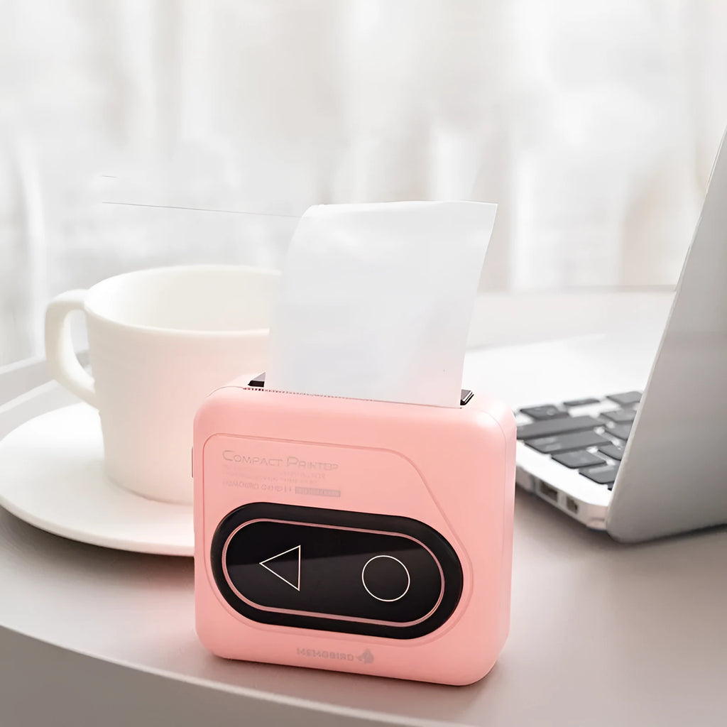 Bluetooth thermal mini printer in avocado green, pink, small yellow duck, or white colours with dimensions 87x79x39mm