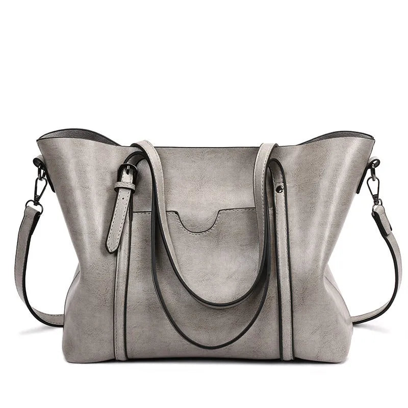 Retro messenger bag for women in PU leather with large A4 capacity and shoulder strap