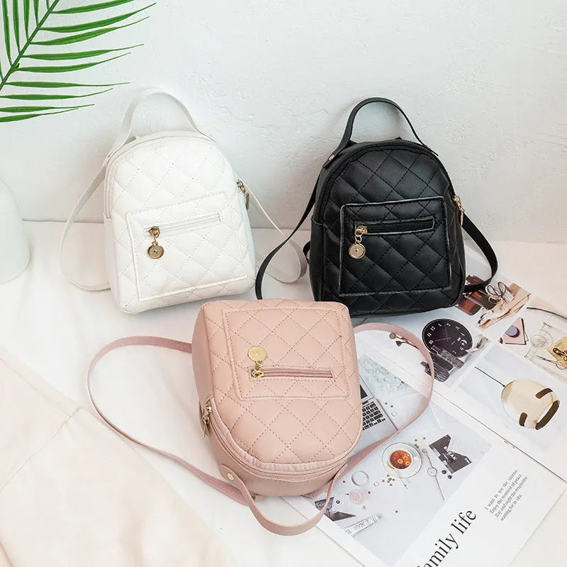 Girls' hard shell square backpack with Korean embroidery in black, pink or white colours showing sandwich pockets and carry handle