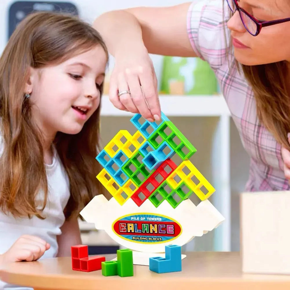 Colourful plastic balance stacking game with 16 blocks, chassis and base for family play