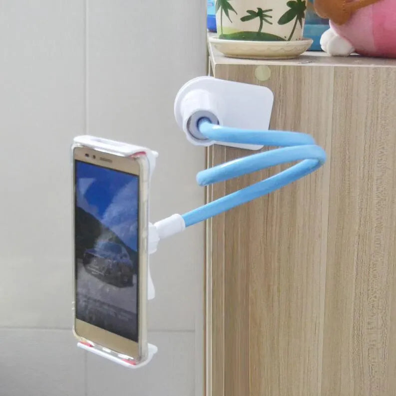 Black bedside oversize flat panel mobile phone holder with adjustable long arm on table