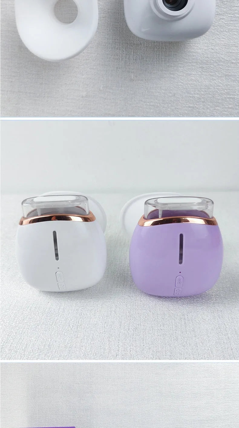 White and purple portable eye humidifier with charging cable and English manual