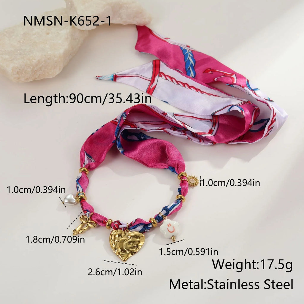 Stainless steel geometric pendant necklace and matching bracelet set with gold electroplating on a white background.