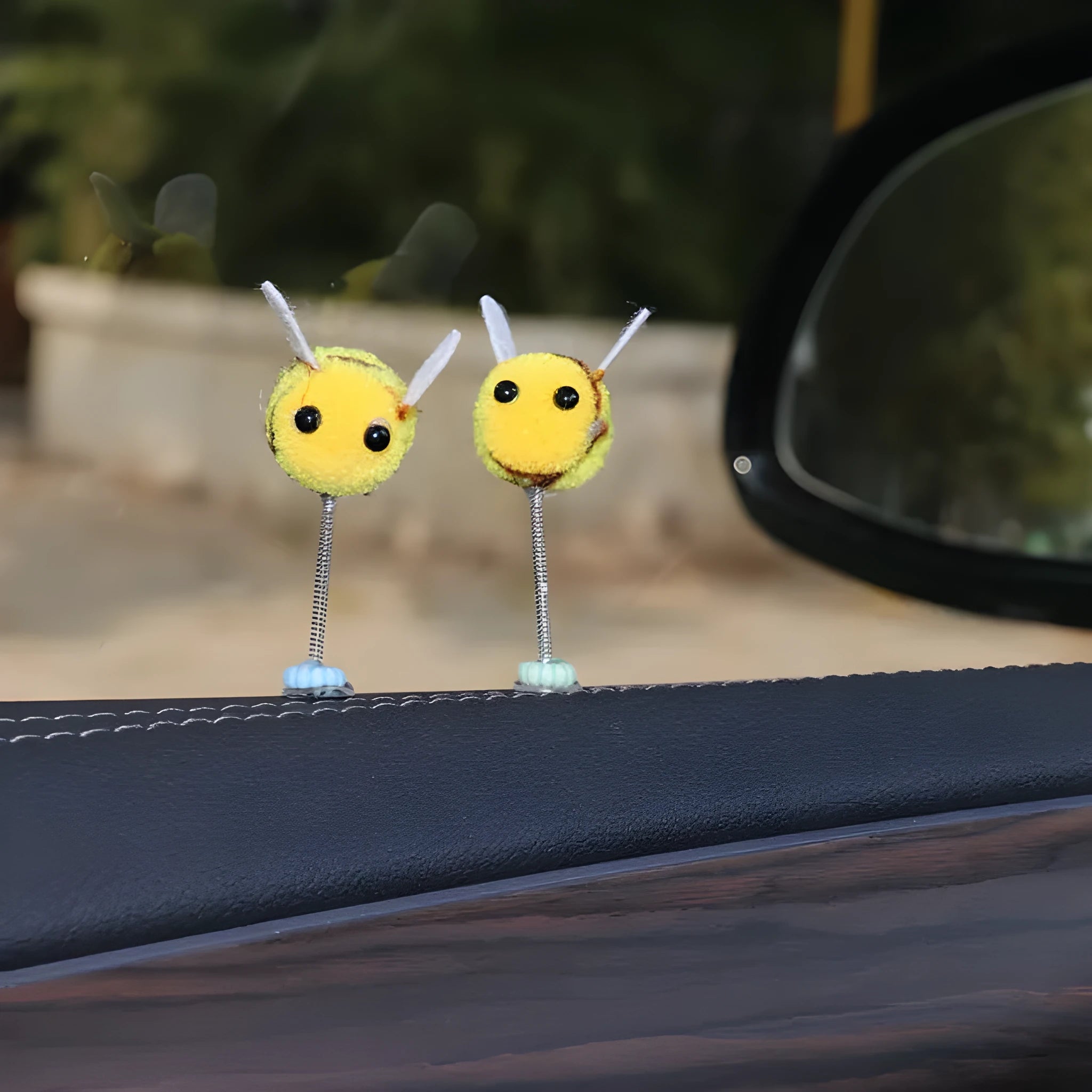 Swing spring bee car decoration with fur ball construction and cartoon design measuring 3x3cm