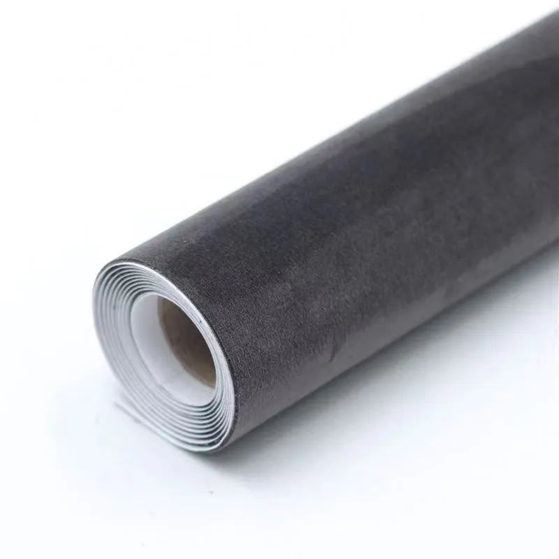 Self-adhesive leather suede sheet roll in multiple colour swatches showing black, brown, blue, and red.