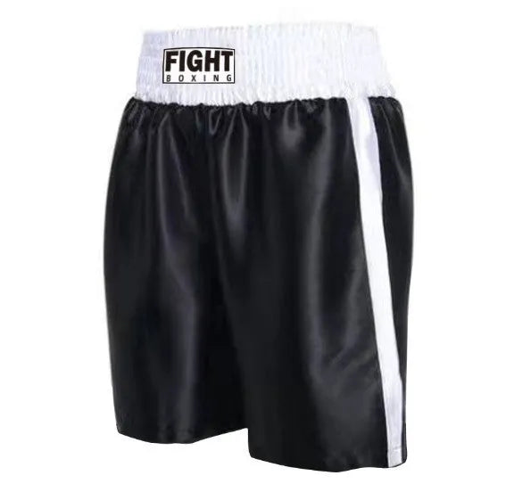 Man wearing black and white boxing shorts with side stripes during a training session