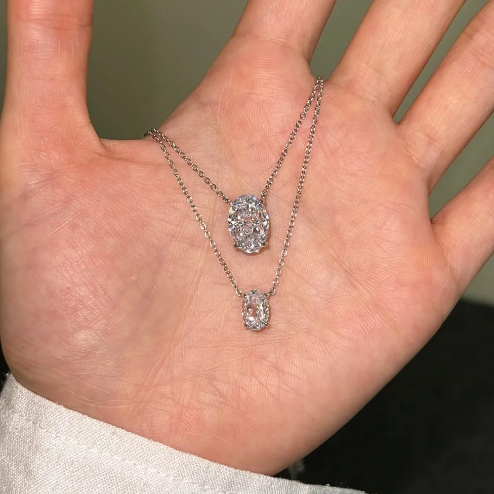 S925 sterling silver necklace with geometric oval ice flower pendant in gold or platinum plating.