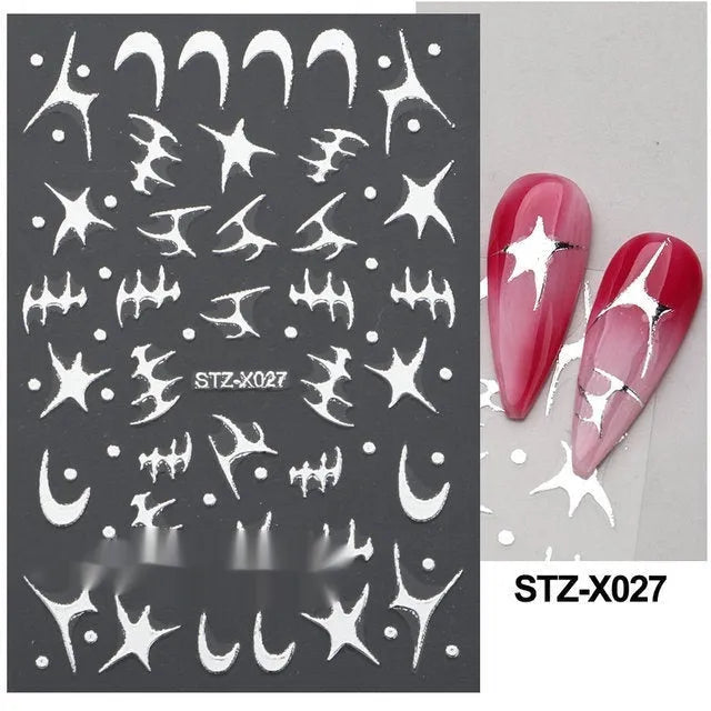Plastic sheet of black, silver, and cartoon design nail art stickers for DIY manicures.