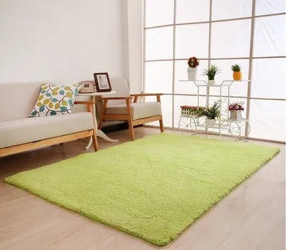 Solid colour plush area rug with non-slip dot-patterned bottom in rectangular shape