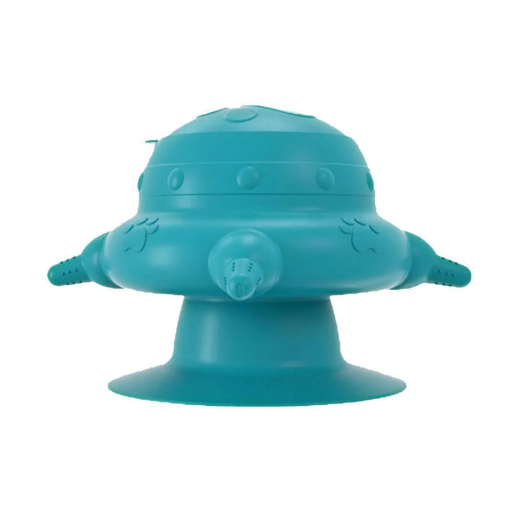 Pink silicone pet milk feeder with four nursing pacifiers and a lid on a flat base.