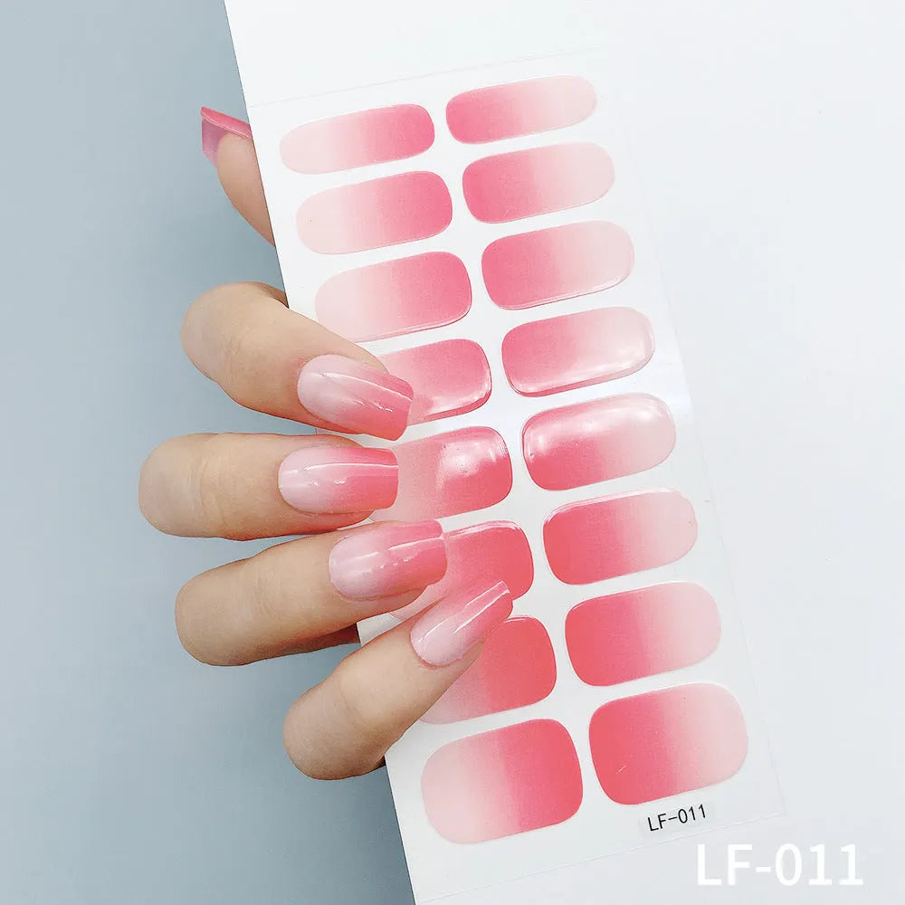 Full nail art sticker sheet showing 16 different solid colour designs including European simple nails and floral patterns