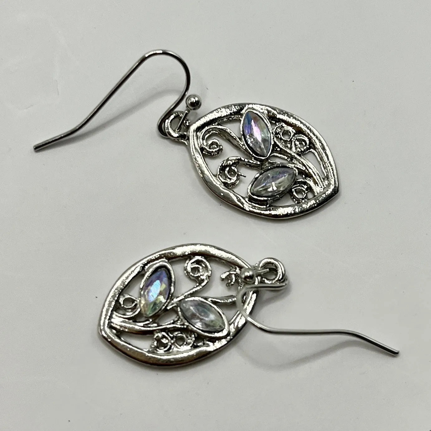 Women's silver alloy earrings with leaf design and embedded colourful moonstone gemstones