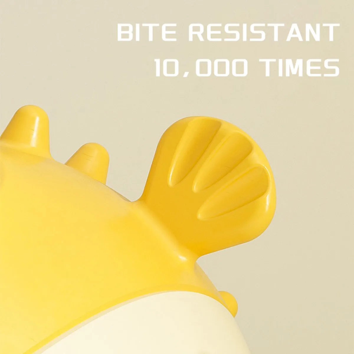 Yellow vinyl fish-shaped dog chew toy with textured surface for dental care
