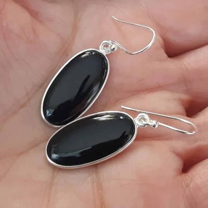 Chinese style women's earrings with oval black agate pendant and 925 silver electroplated alloy construction