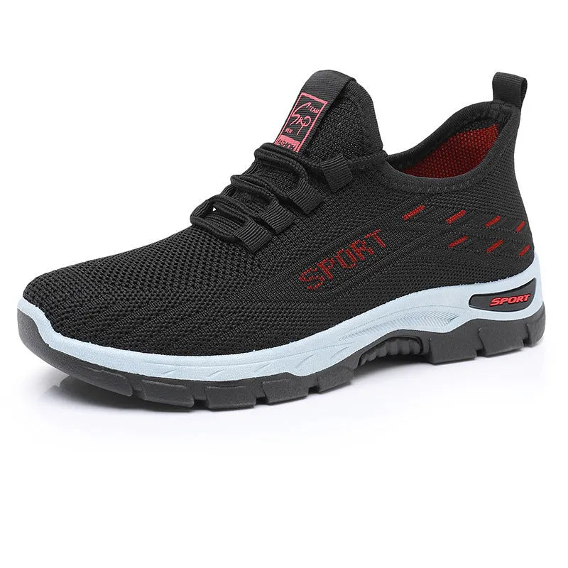 Men's and women's casual low-top sneakers with a soft PVC sole in black, red, light purple, grey, and brown.