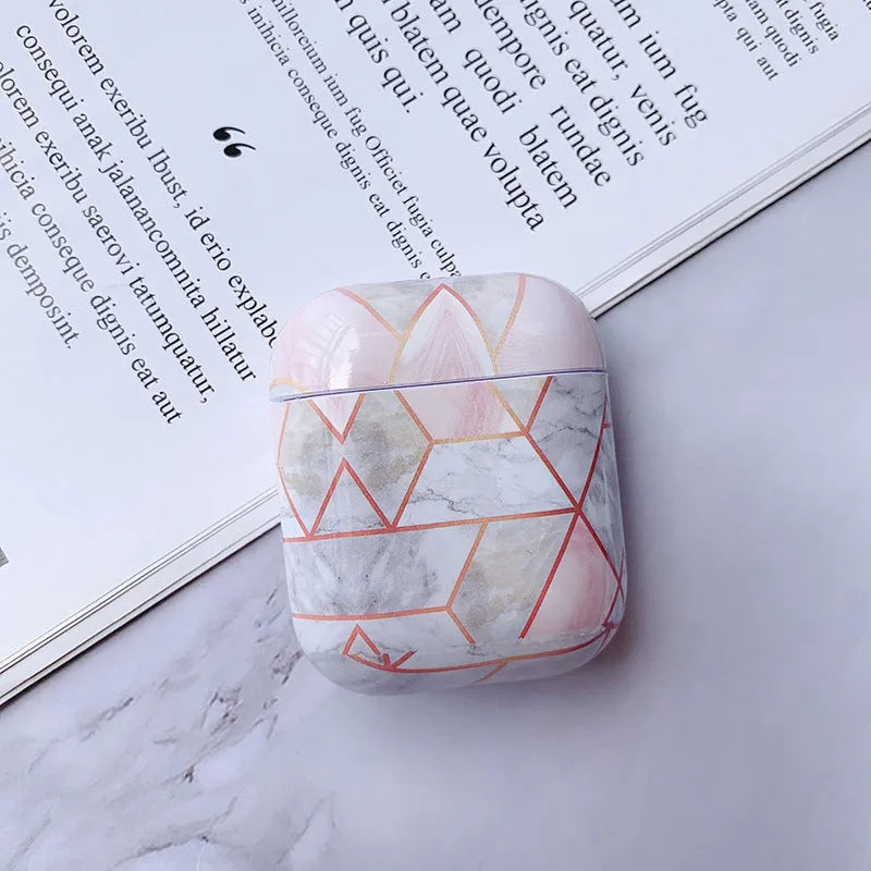 White marble pattern hard protective case for AirPods 1 and AirPods 2 wireless charging box.