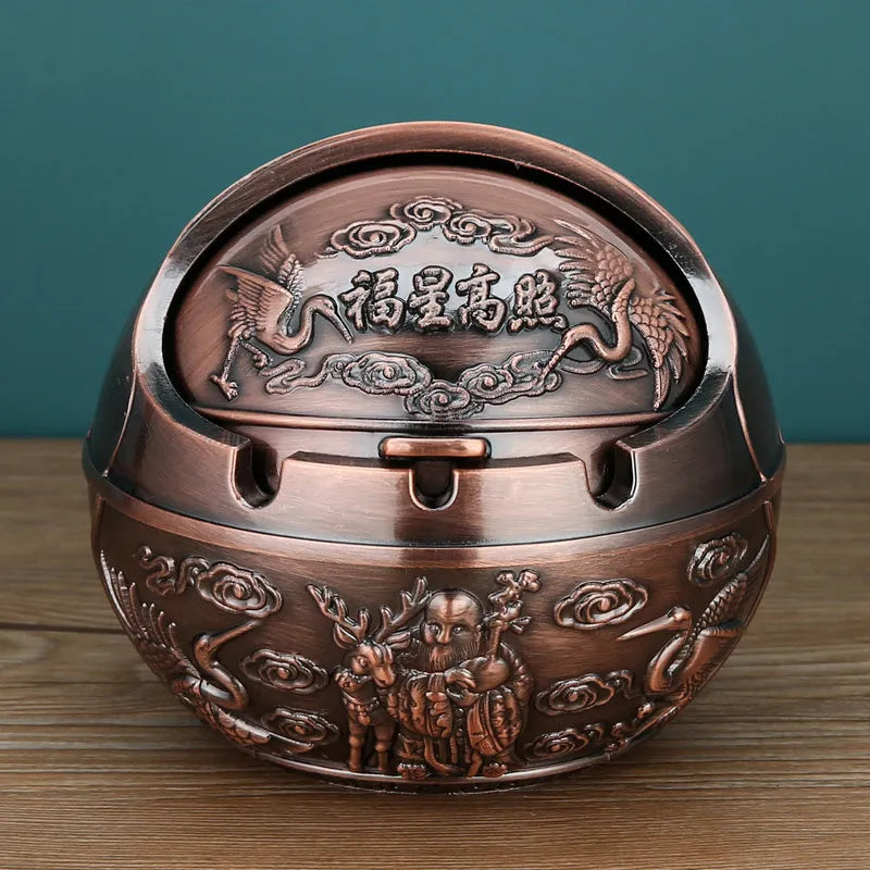 Alloy ashtray with smoke extinguishing slot in bronze finish featuring decorative dragon and phoenix design