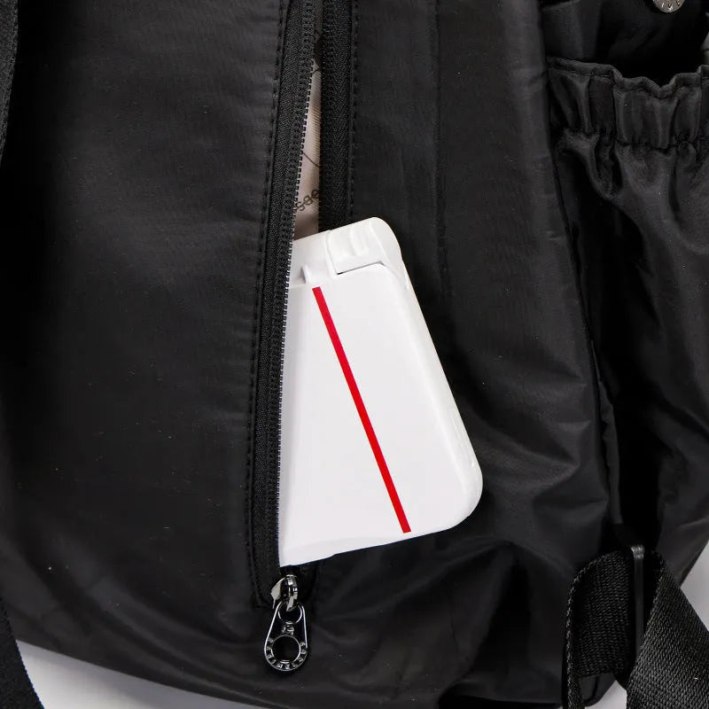 Outdoor backpack with sandwich pocket design showing black, khaki, and green letters colour options