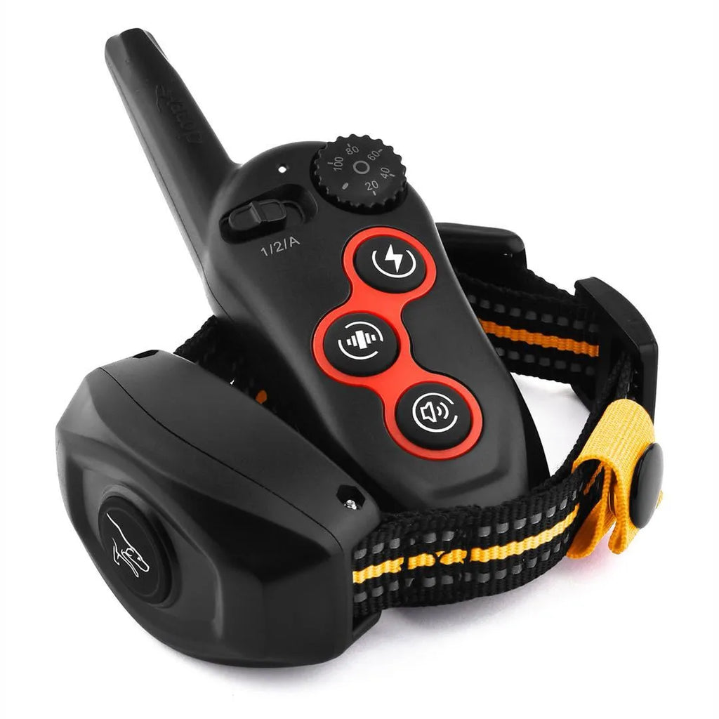 Dog training clicker in orange colour with attached white wrist strap on a white background