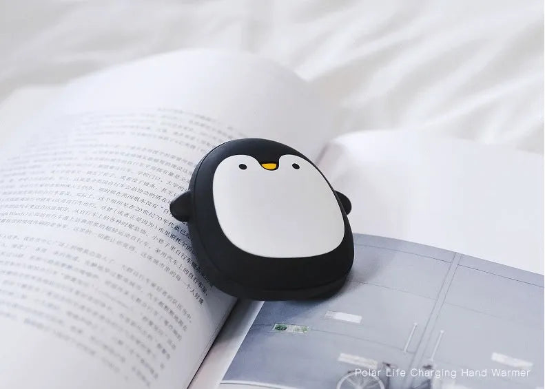 Cartoon penguin polar bear USB rechargeable hand warmer power bank showing black, white, and black-white colour options