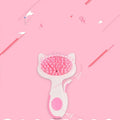 Cat hair comb with ABS resin body, rubber comb needle and nylon bristles, 7.2cm wide by 13cm high, pink colour