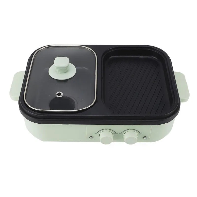 White and green dual-function electric frying oven and hot pot appliance on a kitchen counter.