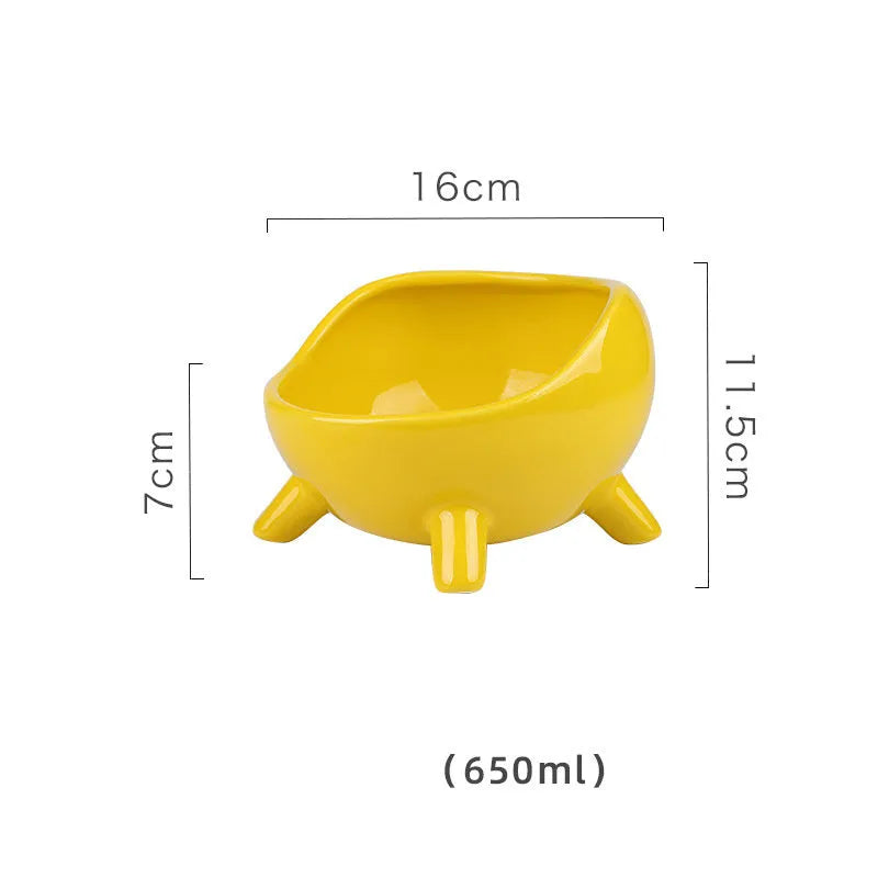 Green four-legged ceramic cat food bowl with elevated base and wide mouth design
