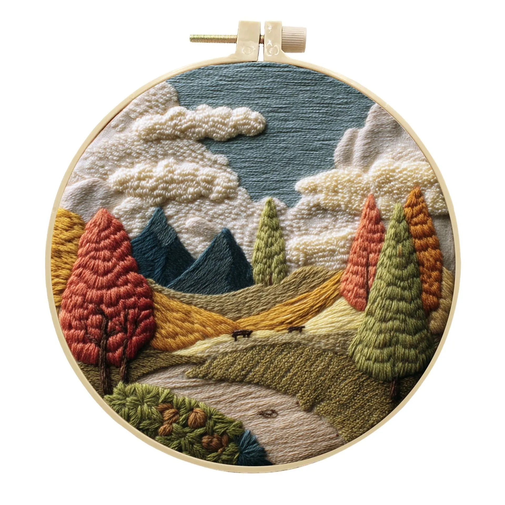 Embroidery DIY kit with printed landscape fabric, embroidery threads, needles, and frame for handmade cloth art