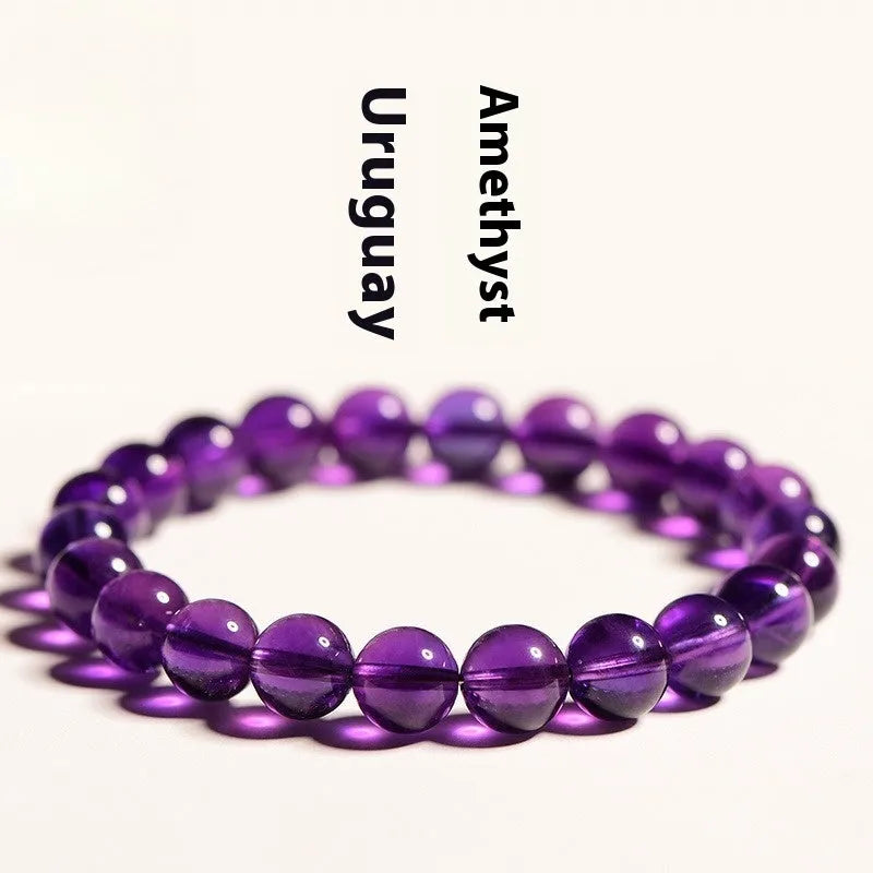 Natural amethyst bracelet with scattered Uruguay beads in selectable sizes and colour grades.